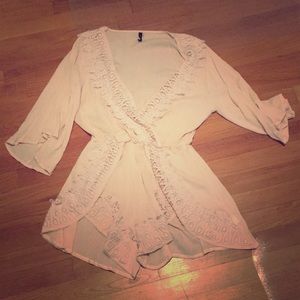 Cream crochet-detail romper size small